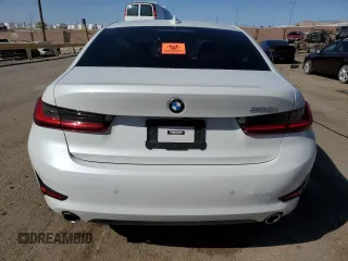 2022 BMW 3 Series 330i with VIN 3MW5R1J05N8C31289, listed as a Copart auction lot 52335505 with Not provided miles and Salvage title. Bid and sale history available at DreamBid. Image 6.