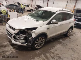 2016 Ford Escape SE with VIN 1FMCU9GX5GUA55969, listed as a IAAI auction lot 41630684 with 168,038 mi miles. Bid and sale history available at carsss.com. Image 2.