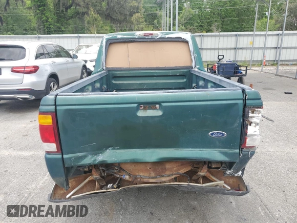 1999 Ford Ranger XL with VIN 1FTYR10C4XTA40745, listed as a Copart auction lot 52181525 with 185,096 mi miles and Salvage Title. Bid and sale history available at carsss.com. Image 6.