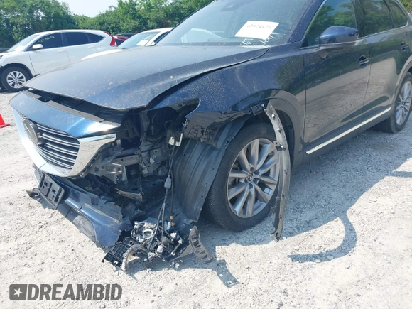 2021 Mazda CX-9 Carbon Edition z VIN JM3TCBDY7M0536005, wystawiony jako IAAI lot #42424129 z przebiegiem 48 005 mil mil oraz . Historia ofert i sprzedaży dostępna na DreamBid. Obrazek 18.