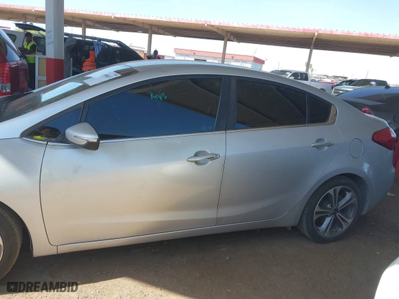 2016 Kia Forte EX with VIN KNAFX4A8XG5598156, listed as a IAAI auction lot 41980015 with 114,672 mi miles. Bid and sale history available at carsss.com. Image 13.