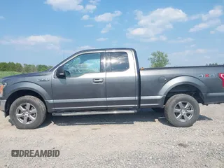 2018 Ford F-150 XL with VIN 1FTFX1E58JFD92806, listed as a IAAI auction lot 42424589 with 144,476 mi miles and . Bid and sale history available at DreamBid. Image 14.