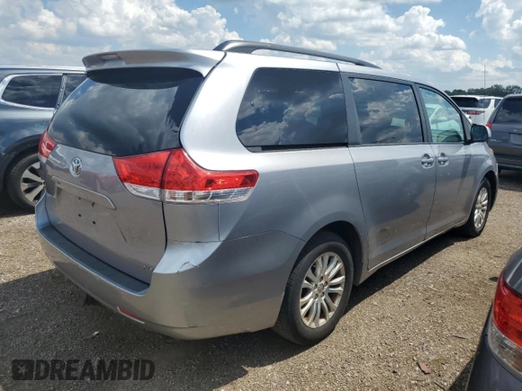 2011 Toyota Sienna XLE AAS с VIN 5TDYK3DCXBS169073, выставлен на аукционе Copart как лот 62084925 с пробегом 153 888 миль миль и Списание • Salvage title. История ставок и продаж доступна на DreamBid. Изображение 3.
