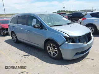 2013 Honda Odyssey EX z VIN 5FNRL5H4XDB062760, wystawiony jako IAAI lot #42063899 z przebiegiem 181 658 mil mil oraz . Historia ofert i sprzedaży dostępna na DreamBid. Obrazek 1.