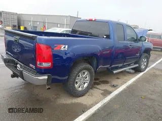 2013 GMC Sierra 1500 SLE with VIN 1GTR2VE70DZ261943, listed as a IAAI auction lot 41767646 with 318,185 mi miles and . Bid and sale history available at DreamBid. Image 4.