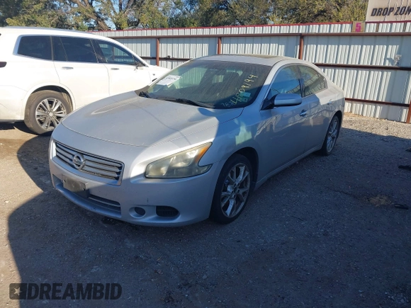 2013 Nissan Maxima SV with VIN 1N4AA5AP4DC807870, listed as a IAAI auction lot 41809194 with 129,034 mi miles and . Bid and sale history available at DreamBid. Image 2.