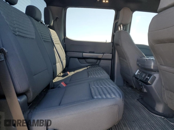 2023 Ford F-150 XL with VIN 1FTFW1E55PKD59670, listed as a Copart auction lot 48297005 with 20,668 mi miles and Salvage Title. Bid and sale history available at carsss.com. Image 10.