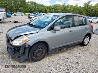 2010 Nissan Versa S with VIN 3N1BC1CP9AL372491, listed as a Copart auction lot 62467025 with 68,977 mi miles and Salvage title. Bid and sale history available at DreamBid. Image 1.