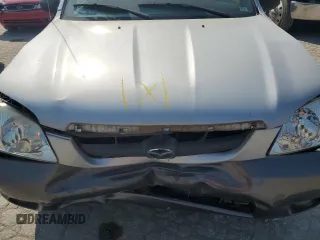 2003 Mazda Tribute LX with VIN 4F2YZ04183KM49513, listed as a Copart auction lot 66000444 with Not Provided miles and Salvage Title. Bid and sale history available at carsss.com. Image 13.