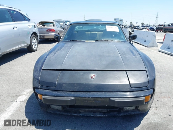 1984 Porsche 944 with VIN WP0AA0947EN459060, listed as a IAAI auction lot 42215176 with 43,863 mi miles and . Bid and sale history available at carsss.com. Image 12.