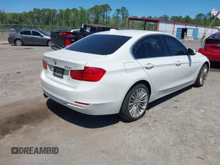 2013 BMW 3 Series 328i xDrive with VIN WBA3B5C51DJ599144, listed as a IAAI auction lot 42059260 with 84,153 mi miles. Bid and sale history available at carsss.com. Image 4.