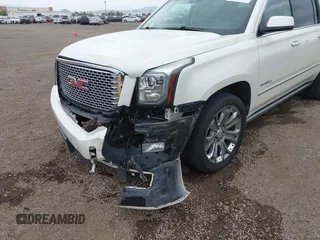 2015 GMC Yukon XL Denali with VIN 1GKS2JKJ7FR641430, listed as a IAAI auction lot 42163969 with 129,085 mi miles. Bid and sale history available at carsss.com. Image 6.