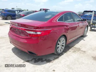 2014 Hyundai Azera Limited with VIN KMHFH4JG4EA424123, listed as a IAAI auction lot 42713937 with 183,254 mi miles and . Bid and sale history available at DreamBid. Image 4.