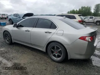 2010 Acura TSX z VIN JH4CU2F6XAC043770, wystawiony jako Copart lot #62398785 z przebiegiem 154 694 mil mil oraz Szkoda całkowita • Salvage title. Historia ofert i sprzedaży dostępna na DreamBid. Obrazek 2.