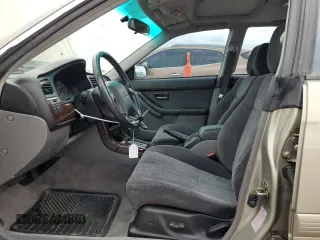 2000 Subaru Legacy with VIN 4S3BE6451Y7207874, listed as a Copart auction lot 59583325 with 57,861 mi miles and Salvage title. Bid and sale history available at DreamBid. Image 7.