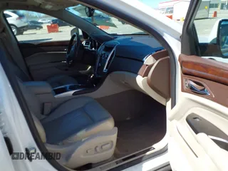 2012 Cadillac SRX Performance Collection with VIN 3GYFNBE33CS614655, listed as a IAAI auction lot 41818918 with 176,899 mi miles. Bid and sale history available at carsss.com. Image 5.