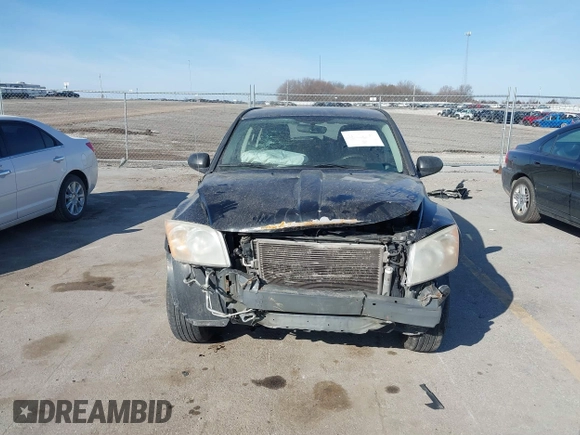 2010 Dodge Caliber SXT with VIN 1B3CB4HA4AD651946, listed as a IAAI auction lot 41771139 with 165,663 mi miles and . Bid and sale history available at DreamBid. Image 6.