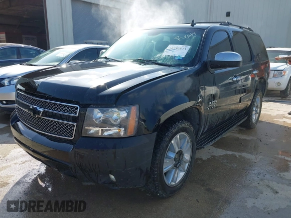 2011 Chevrolet Tahoe LS with VIN 1GNSCAE05BR380084, listed as a IAAI auction lot 42746873 with 386,755 mi miles and . Bid and sale history available at DreamBid. Image 2.