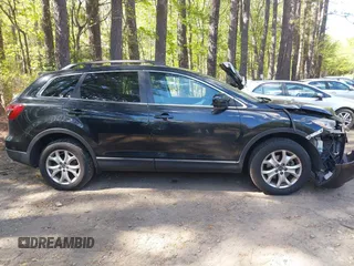 2014 Mazda CX-9 Touring with VIN JM3TB3CV1E0428688, listed as a IAAI auction lot 42052151 with 208,050 mi miles and . Bid and sale history available at DreamBid. Image 13.