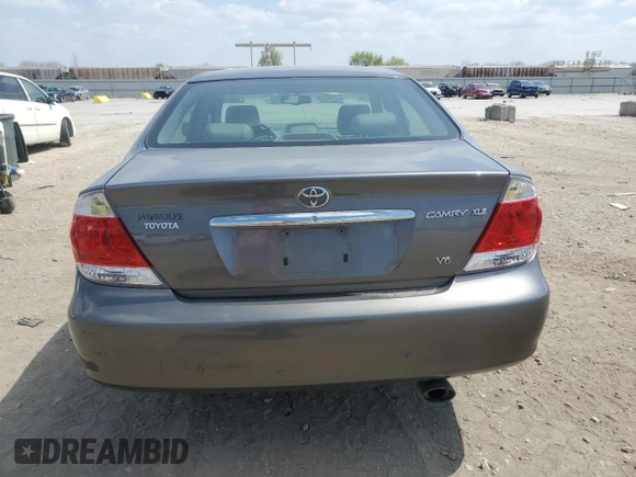 2005 Toyota Camry LE with VIN 4T1BF32K85U614653, listed as a Copart auction lot 52860195 with 156,675 mi miles and Salvage Title. Bid and sale history available at DreamBid. Image 6.