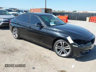 2013 BMW 3 Series 328i with VIN WBA3A5C56DF357861, listed as a IAAI auction lot 41963968 with 159,082 mi miles. Bid and sale history available at carsss.com. Image 1.