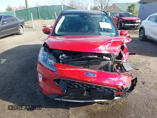 2021 Ford Escape Titanium with VIN 1FMCU9J9XMUA70800, listed as a IAAI auction lot 41717946 with Not Provided miles and . Bid and sale history available at carsss.com. Image 11.