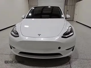 2022 Tesla Model Y Long Range with VIN 7SAYGDEE8NF310841, listed as a Copart auction lot 81005005 with 51,842 mi miles and Clean title. Bid and sale history available at DreamBid. Image 15.