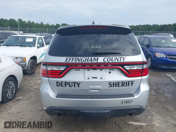 2023 Dodge Durango Pursuit with VIN 1C4SDJFT5PC629959, listed as a IAAI auction lot 40274866 with 6,877 mi miles and . Bid and sale history available at DreamBid. Image 16.