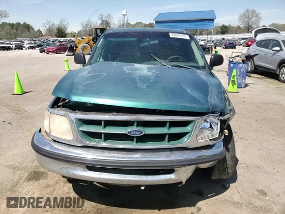 1998 Ford F-150 z VIN 1FTZF176XWNB03959, wystawiony jako Copart lot #49043105 z przebiegiem 300 884 mil mil oraz Szkoda całkowita • Salvage title. Historia ofert i sprzedaży dostępna na DreamBid. Obrazek 10.