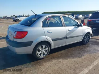 2009 Kia Rio SX with VIN KNADE223296523842, listed as a IAAI auction lot 42024905 with 98,613 mi miles. Bid and sale history available at carsss.com. Image 4.