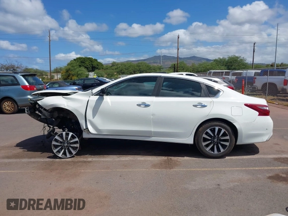 2018 Nissan Altima SV with VIN 1N4AL3AP5JC134629, listed as a IAAI auction lot 41979842 with Not Provided miles and . Bid and sale history available at DreamBid. Image 14.