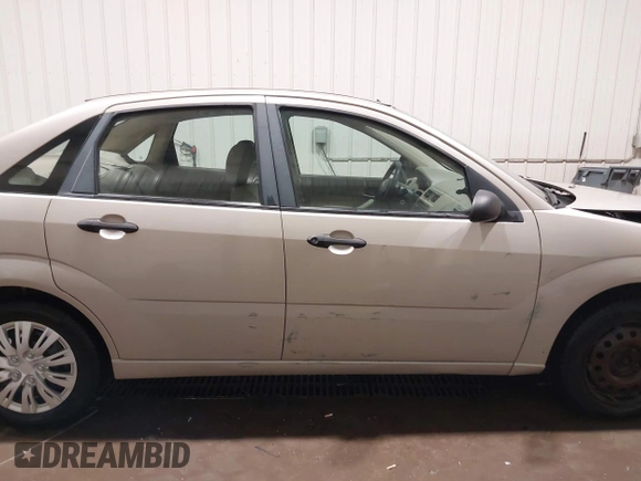 2007 Ford Focus S with VIN 1FAFP34N67W226828, listed as a IAAI auction lot 41457517 with 174,519 mi miles and . Bid and sale history available at DreamBid. Image 14.