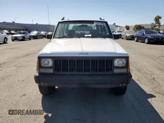 1994 Jeep Cherokee Sport with VIN 1J4FT68S2RL189475, listed as a Copart auction lot 53697465 with 188,210 mi miles and Clean Title. Bid and sale history available at carsss.com. Image 5.