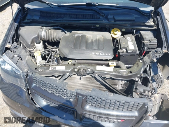 2016 Dodge Grand Caravan SXT with VIN 2C4RDGCG2GR118242, listed as a IAAI auction lot 41981178 with 150,586 mi miles and . Bid and sale history available at DreamBid. Image 10.
