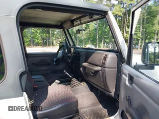1999 Jeep Wrangler Sport with VIN 1J4FY19S1XP417362, listed as a IAAI auction lot 42738296 with 228,066 mi miles and . Bid and sale history available at DreamBid. Image 5.