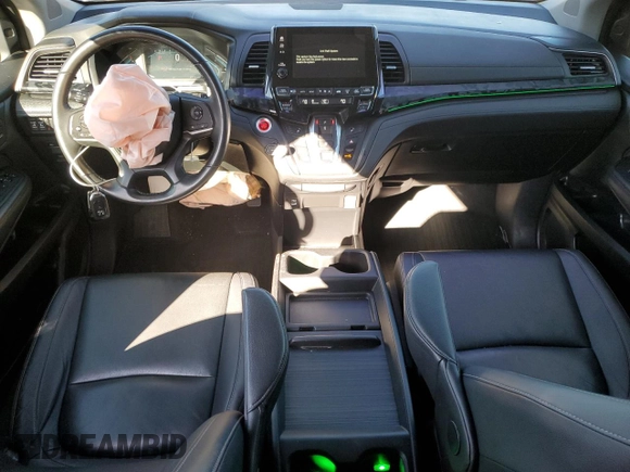 2021 Honda Odyssey EX-L with VIN 5FNRL6H78MB019258, listed as a Copart auction lot 52496285 with 33,734 mi miles and Salvage Title. Bid and sale history available at DreamBid. Image 8.