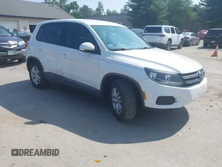2013 Volkswagen Tiguan SE with VIN WVGAV3AX4DW598367, listed as a IAAI auction lot 42520821 with 104,544 mi miles and . Bid and sale history available at DreamBid. Image 1.