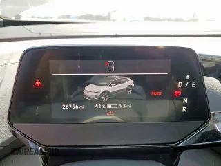 2023 Volkswagen ID.4 Pro z VIN 1V2VMPE88PC022658, wystawiony jako Copart lot #52888005 z przebiegiem 26 756 mil mil oraz Szkody całkowita. Historia ofert i sprzedaży dostępna na DreamBid. Obrazek 9.
