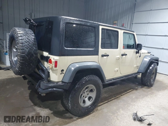 2012 Jeep Wrangler Unlimited Call of Duty MW3 with VIN 1C4BJWFGXCL105130, listed as a Copart auction lot 85747614 with 77,953 mi miles and Salvage title. Bid and sale history available at DreamBid. Image 3.
