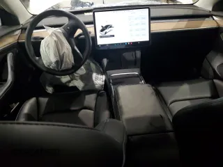 2021 Tesla Model 3 Standard Range Plus z VIN 5YJ3E1EA4MF988784, wystawiony jako Copart lot #88138765 z przebiegiem 62 438 mil mil oraz Szkody całkowita. Historia ofert i sprzedaży dostępna na DreamBid. Obrazek 8.