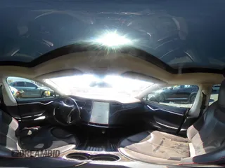 2014 Tesla Model S 60 z VIN 5YJSA1H13EFP42250, wystawiony jako IAAI lot #42267590 z przebiegiem 196 142 mil mil oraz . Historia ofert i sprzedaży dostępna na DreamBid. Obrazek 19.