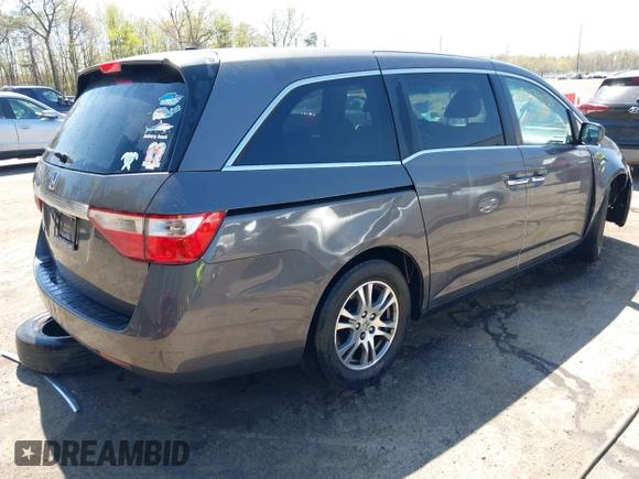 2012 Honda Odyssey EX-L with VIN 5FNRL5H68CB006686, listed as a IAAI auction lot 42039035 with 338,331 mi miles and . Bid and sale history available at carsss.com. Image 4.