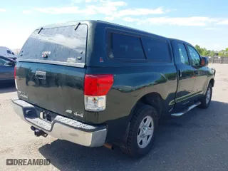 2010 Toyota Tundra 4WD Truck with VIN 5TFUW5F11AX103188, listed as a IAAI auction lot 39811998 with 198,948 mi miles. Bid and sale history available at carsss.com. Image 4.