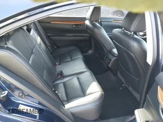 2014 Lexus ES 300h with VIN JTHBW1GG7E2071500, listed as a IAAI auction lot 41676321 with 64,217 mi miles and . Bid and sale history available at DreamBid. Image 8.