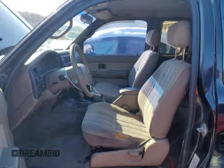 1998 Toyota Tacoma with VIN 4TAWN72N6WZ106014, listed as a Copart auction lot 87767435 with 167,626 mi miles and Salvage Title. Bid and sale history available at DreamBid. Image 7.