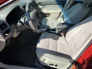 2012 Ford Fusion SE z VIN 3FAHP0HA0CR160191, wystawiony jako Copart lot #59216465 z przebiegiem 73 945 mil mil oraz Szkoda całkowita • Salvage title. Historia ofert i sprzedaży dostępna na DreamBid. Obrazek 7.