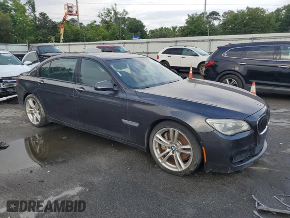 2014 BMW 7 Series ALPINA B7 with VIN WBAYE8C59ED134867, listed as a Copart auction lot 54244305 with 111,565 mi miles and Clean title. Bid and sale history available at DreamBid. Image 4.