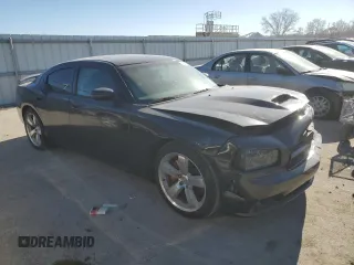 2006 Dodge Charger SRT-8 with VIN 2B3KA73W76H421802, listed as a Copart auction lot 83709404 with Not Provided miles and Salvage Title. Bid and sale history available at DreamBid. Image 4.