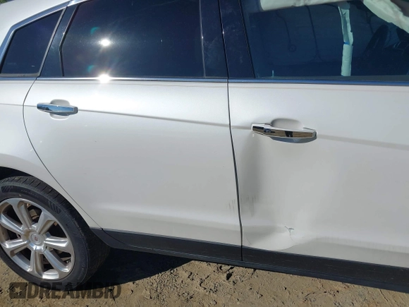 2013 Cadillac SRX Performance Collection with VIN 3GYFNHE31DS597987, listed as a IAAI auction lot 42319058 with 139,670 mi miles and . Bid and sale history available at DreamBid. Image 6.