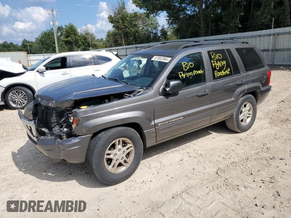 2002 Jeep Grand Cherokee with VIN 1J8GX48S12C255290, listed as a Copart auction lot 57832025 with 191,293 mi miles and Non repairable. Bid and sale history available at DreamBid. Image 1.